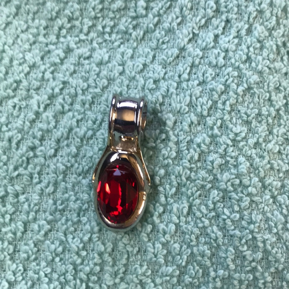Red,silver and gold high fashion pendant.
